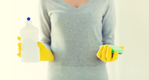Domestic cleaning service for a Chiswick home with a tidy living room and kitchen
