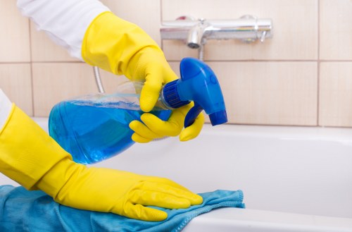 Cleaning carpet tiles in a West London commercial workspace